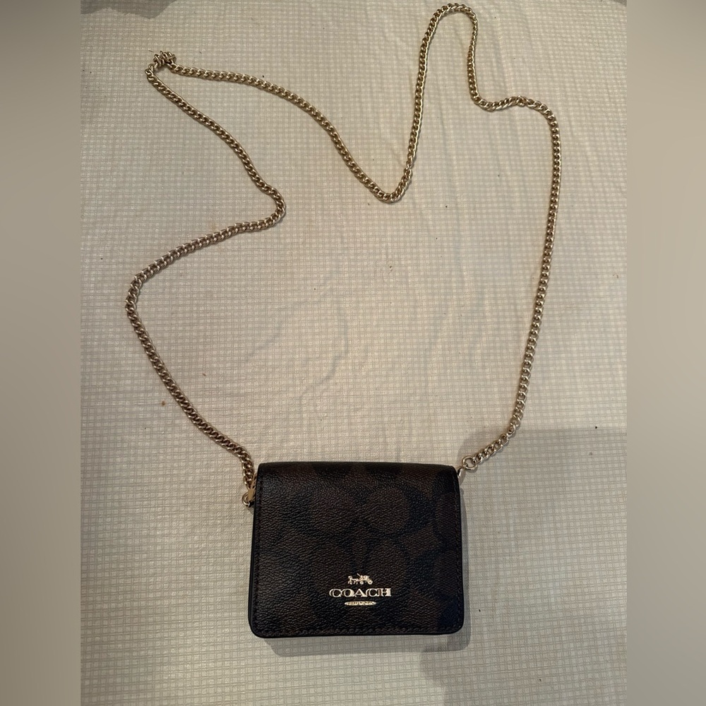 Coach credit card wallet on a gold chain